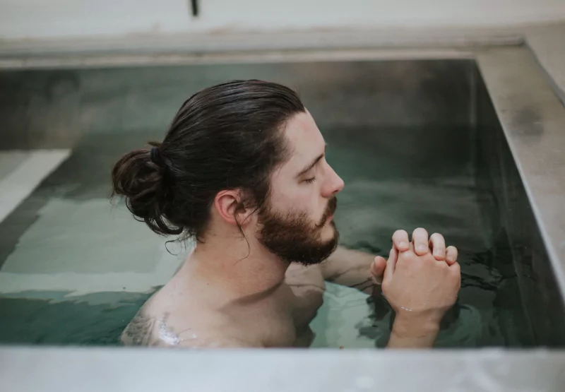 a man inside an ice bath